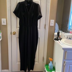 Ladies Kari Blue short sleeve black jumpsuit.  Size large.